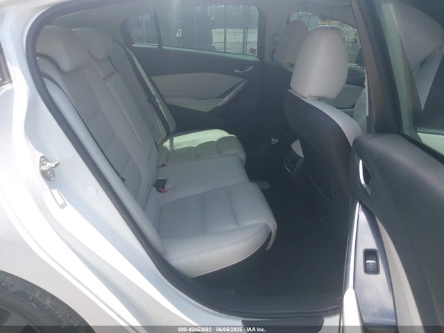 JM1GJ1W51G1477142 Mazda py