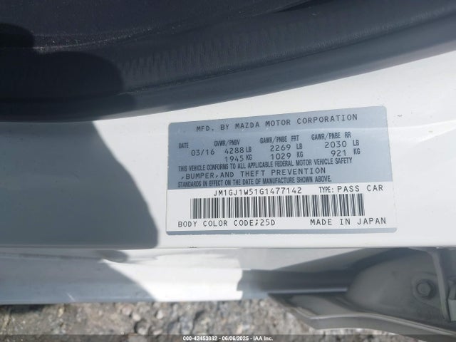 JM1GJ1W51G1477142 Mazda py