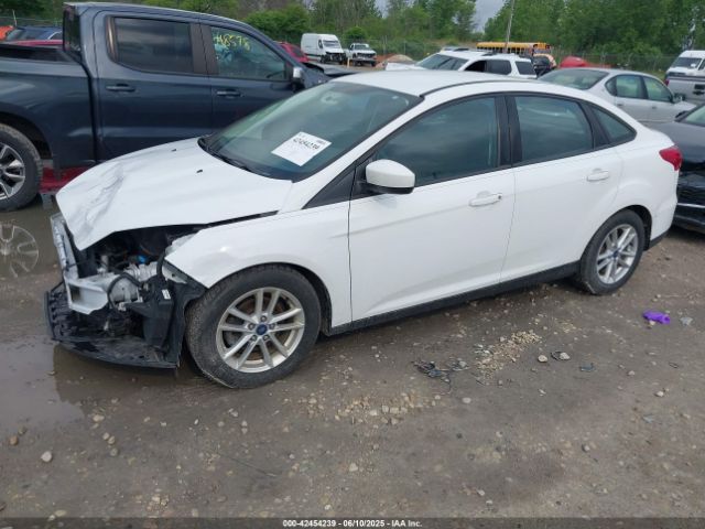 2018 FORD FOCUS 1FADP3F27JL277094 Photo 1
