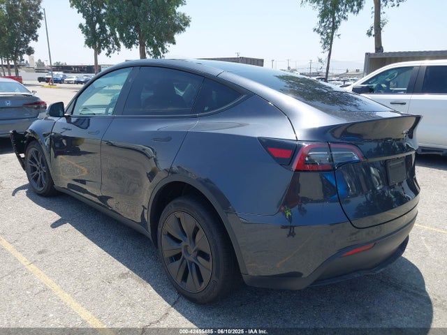 2025 TESLA MODEL Y 7SAYGDEE1SF283932 Photo 2