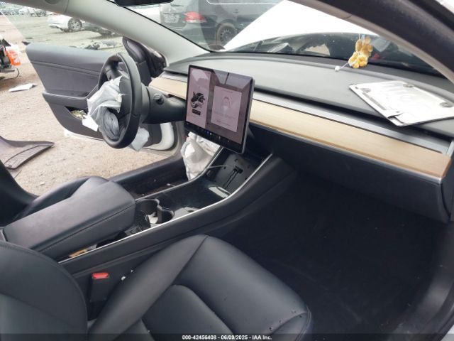 5YJ3E1EA3LF659136 Tesla 2020