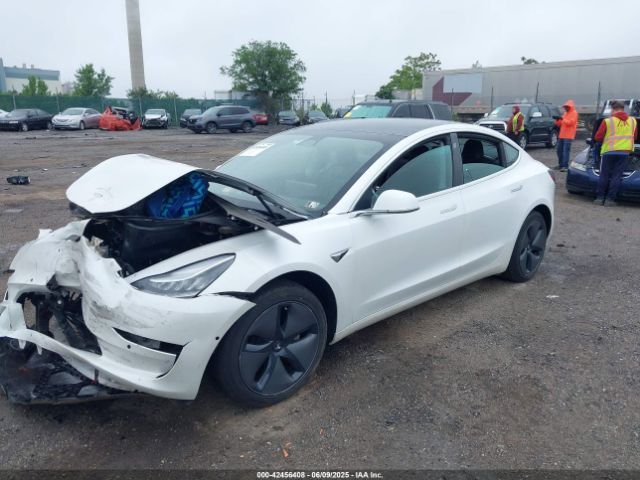 5YJ3E1EA3LF659136 Tesla 2020