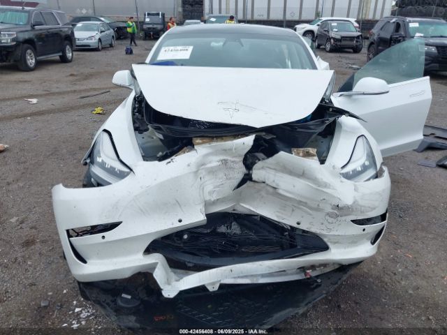 5YJ3E1EA3LF659136 Tesla 2020
