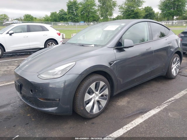 2023 TESLA MODEL Y 7SAYGDEE1PF879016 Photo 1