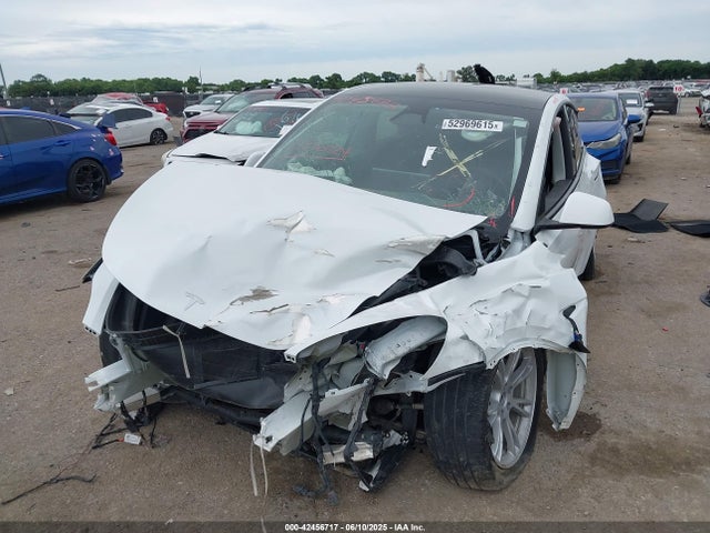 2024 TESLA MODEL Y 7SAYGDEE7RA274787 Photo 1