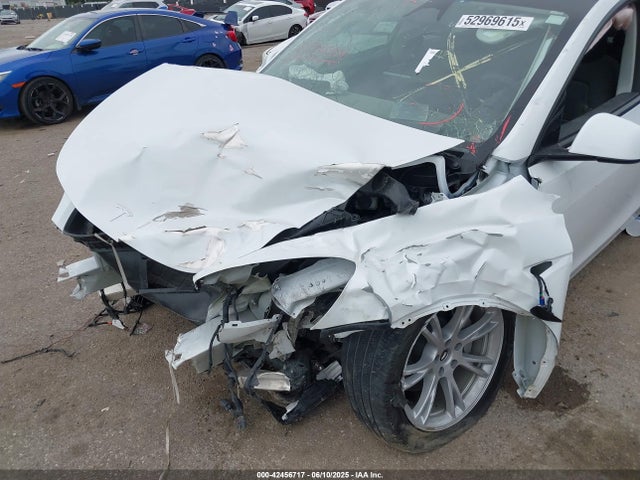 2024 TESLA MODEL Y 7SAYGDEE7RA274787 Photo 5
