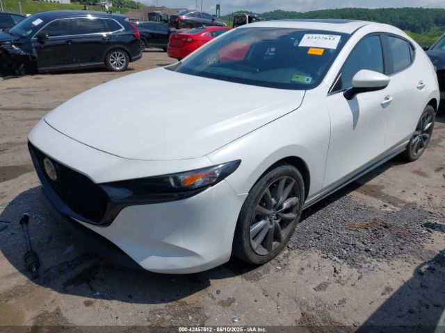 2021 MAZDA MAZDA3 HATCHBACK JM1BPBLL6M1328674 Photo 1