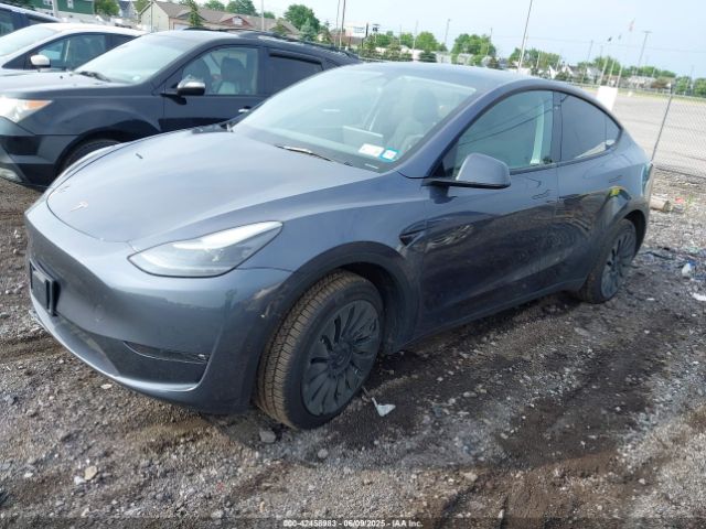 2023 TESLA MODEL Y 7SAYGDEE5PF786497 Photo 1