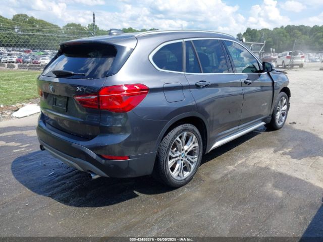 2017 BMW X1 WBXHT3Z38H4A55086 Photo 3