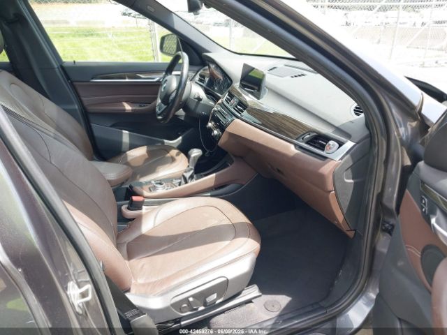 2017 BMW X1 WBXHT3Z38H4A55086 Photo 4