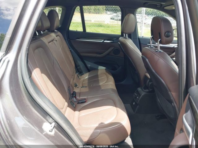 2017 BMW X1 WBXHT3Z38H4A55086 Photo 7