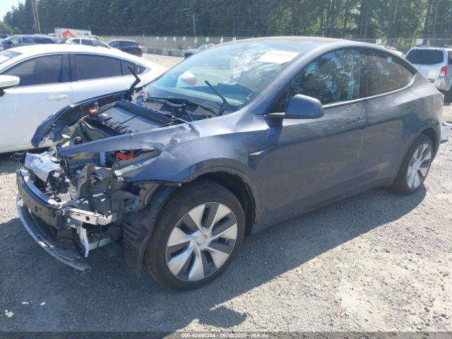 2023 TESLA MODEL Y 7SAYGAEE2PF910479 Photo 1