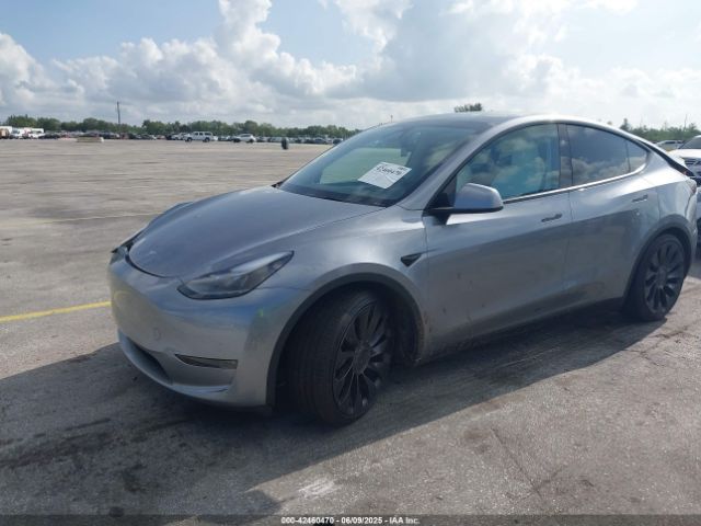 2024 TESLA MODEL Y 7SAYGDEF7RA296765 Photo 1