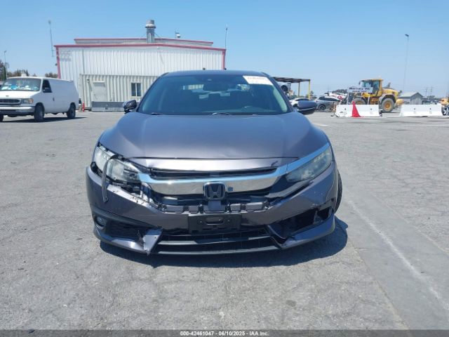 2HGFC1F98GH657066 Honda l15b7