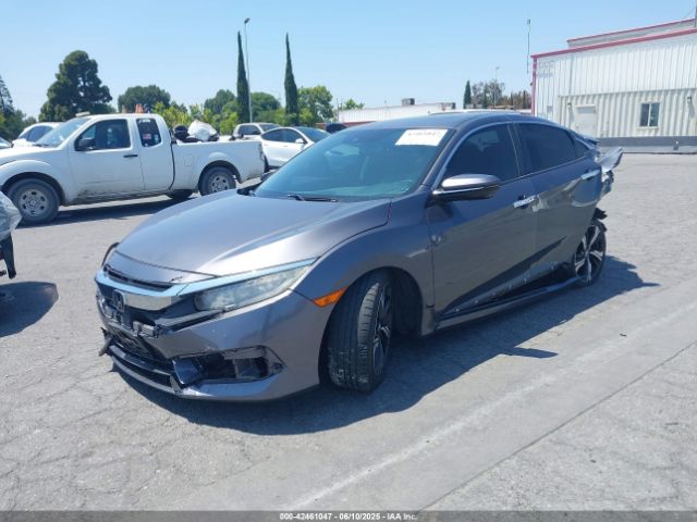 2HGFC1F98GH657066 Honda l15b7