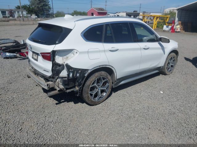 2018 BMW X1 WBXHT3C38J5L27142 Photo 3