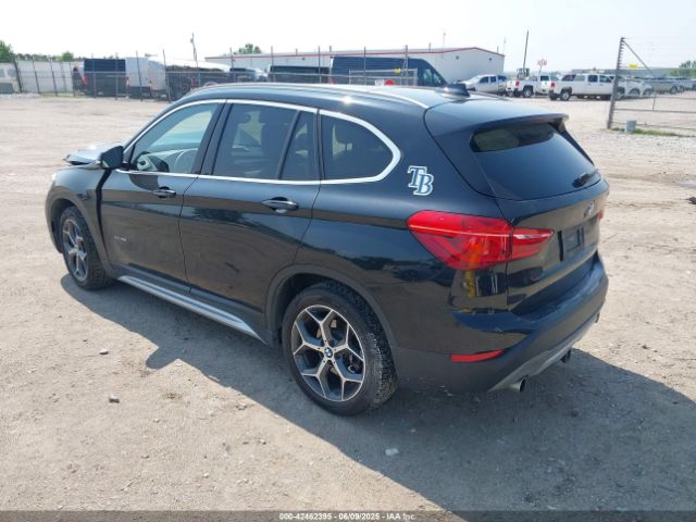 2018 BMW X1 WBXHT3C36J5K23930 Photo 2