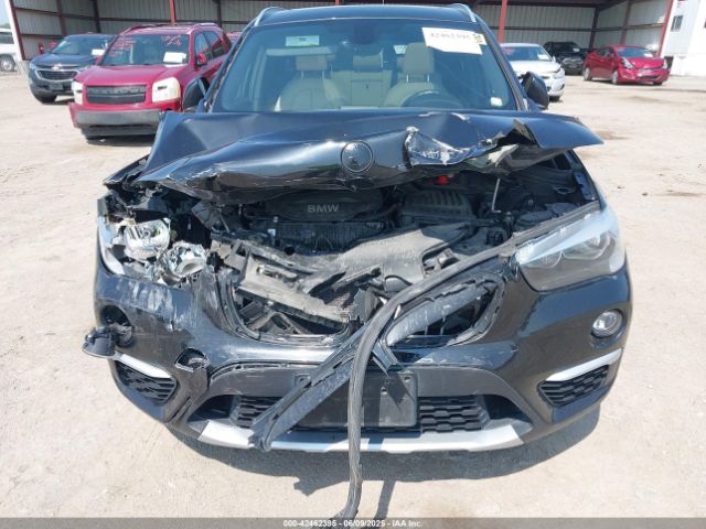 2018 BMW X1 WBXHT3C36J5K23930 Photo 5