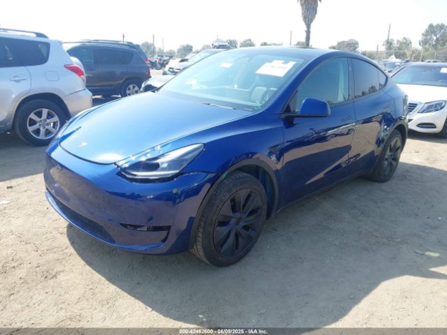 2024 TESLA MODEL Y 7SAYGDED2RF119770 Photo 1