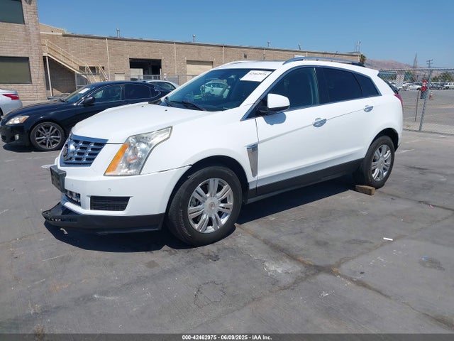 2015 CADILLAC SRX 3GYFNBE33FS542022 Photo 1