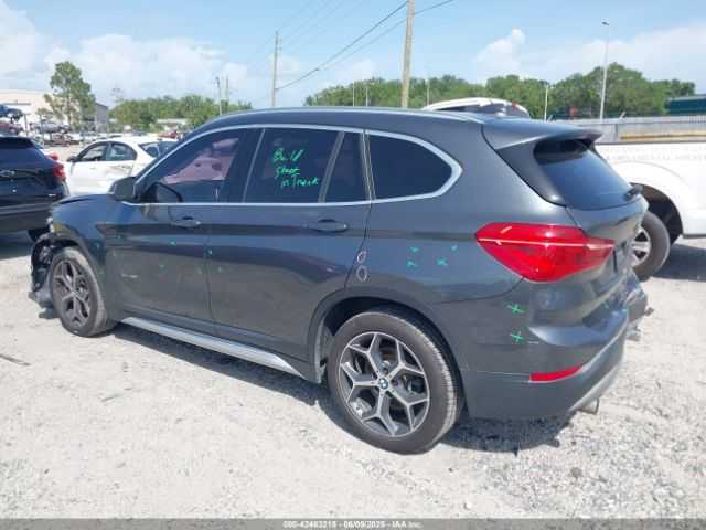 2018 BMW X1 WBXHT3C38J5F88807 Photo 2