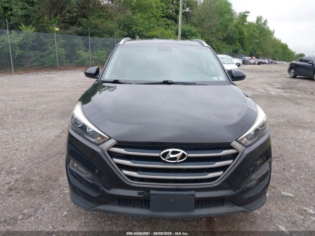 KM8J3CA45GU041303 Hyundai TUCSON SE