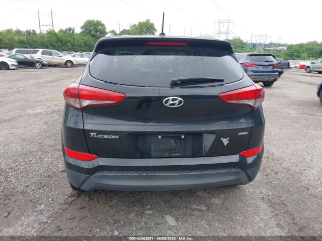 KM8J3CA45GU041303 Hyundai TUCSON SE