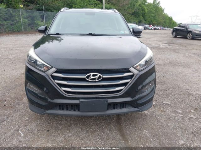 KM8J3CA45GU041303 Hyundai TUCSON SE