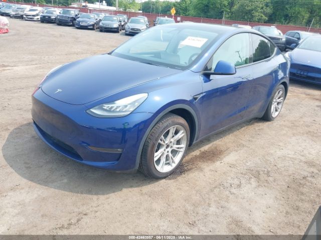 2023 TESLA MODEL Y 7SAYGDEE5PF613627 Photo 1