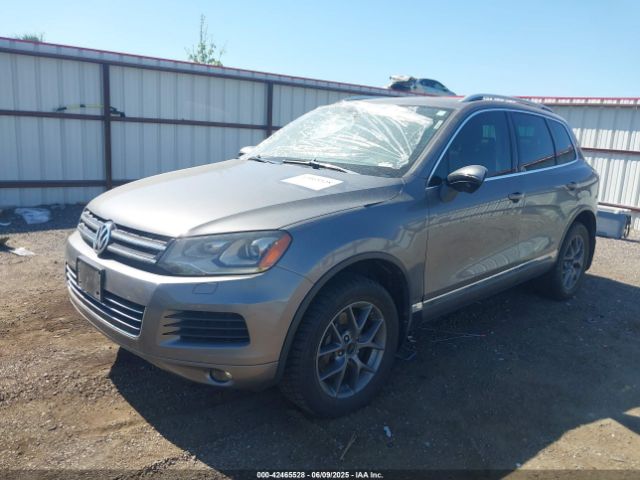 2014 VOLKSWAGEN TOUAREG WVGEP9BPXED005458 Photo 1