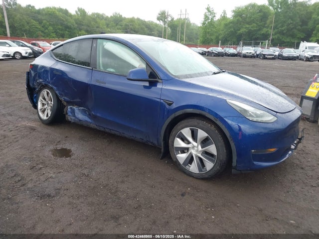 2023 TESLA MODEL Y 7SAYGDEE2PF683649 Photo 0