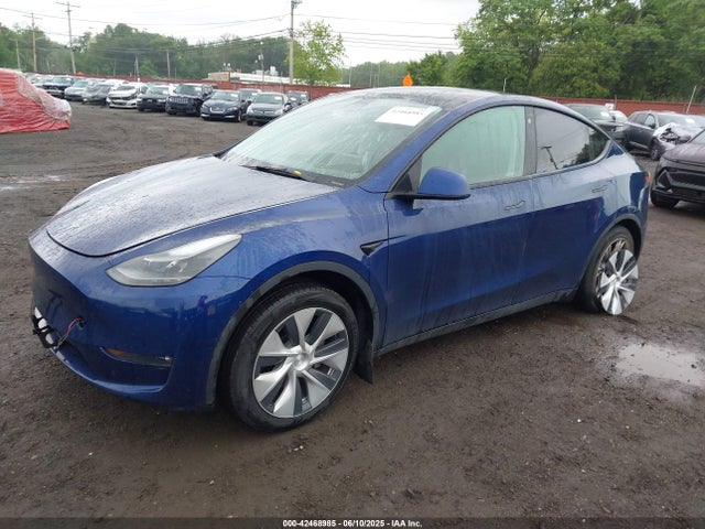 2023 TESLA MODEL Y 7SAYGDEE2PF683649 Photo 1