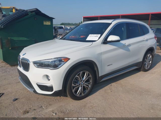 2016 BMW X1 WBXHT3Z37G4A48242 Photo 1