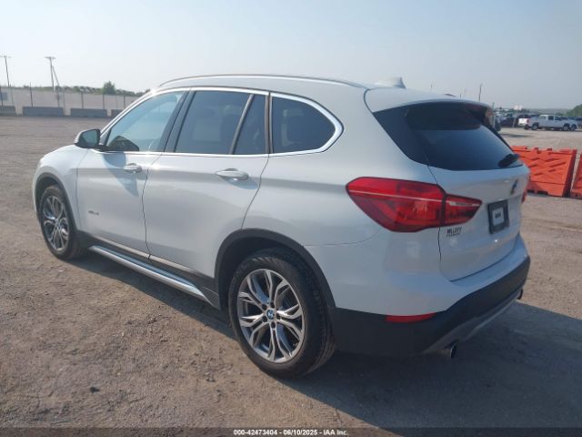 2016 BMW X1 WBXHT3Z37G4A48242 Photo 2