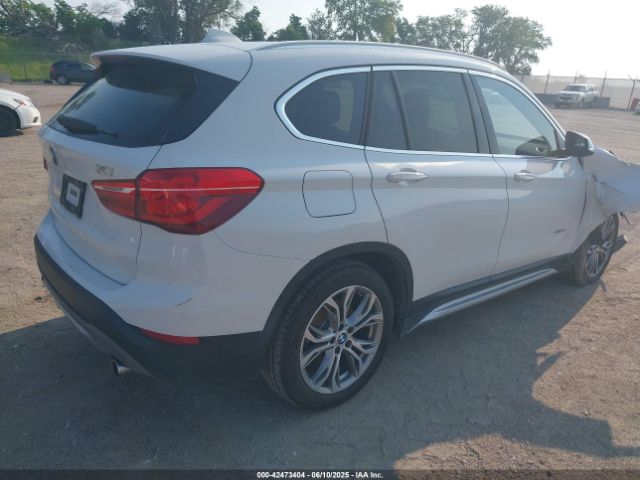 2016 BMW X1 WBXHT3Z37G4A48242 Photo 3