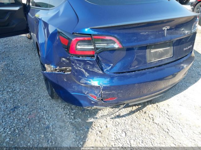 5YJ3E1EC3NF118592 Tesla 2022