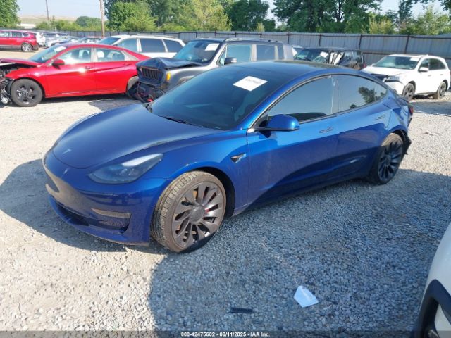 5YJ3E1EC3NF118592 Tesla 2022