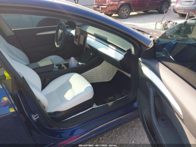 5YJ3E1EC3NF118592 Tesla 2022