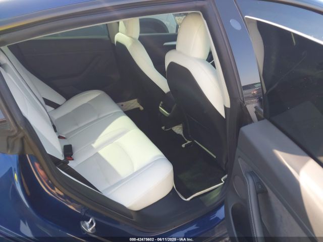 5YJ3E1EC3NF118592 Tesla 2022