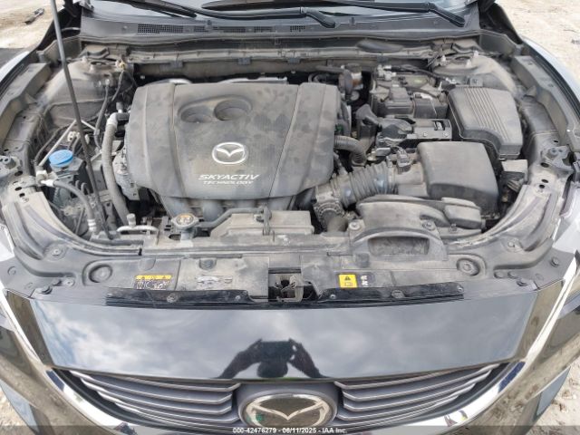 JM1GJ1W57G1404132 Mazda py