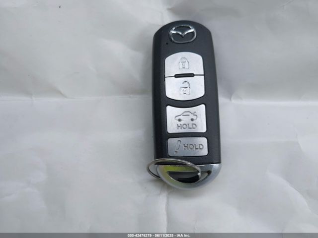 JM1GJ1W57G1404132 Mazda py