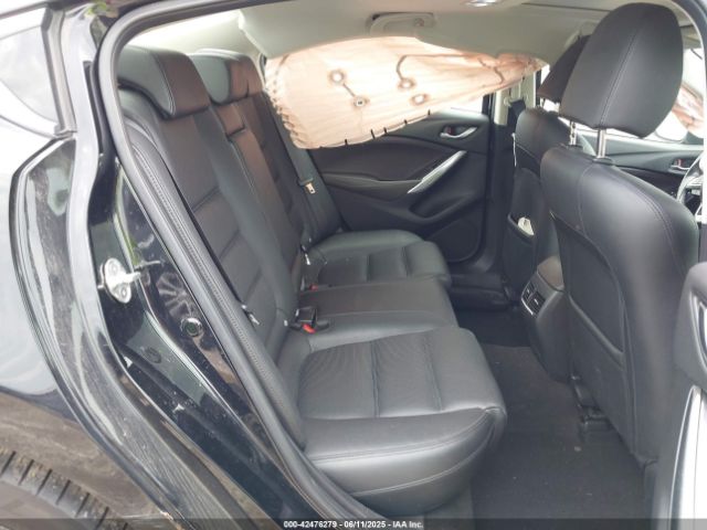 JM1GJ1W57G1404132 Mazda py