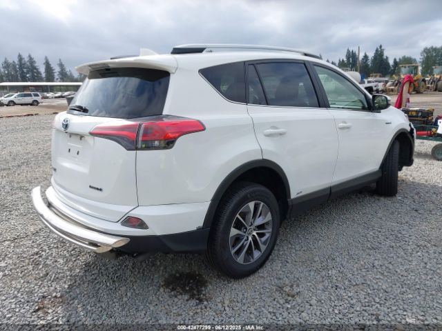 2018 TOYOTA RAV4 HYBRID JTMRJREV6JD255517 Photo 3