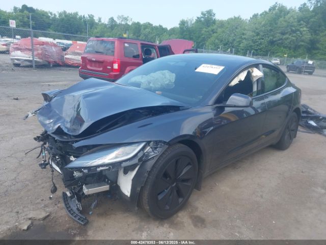 5YJ3E1EB2SF899446 Tesla 2025