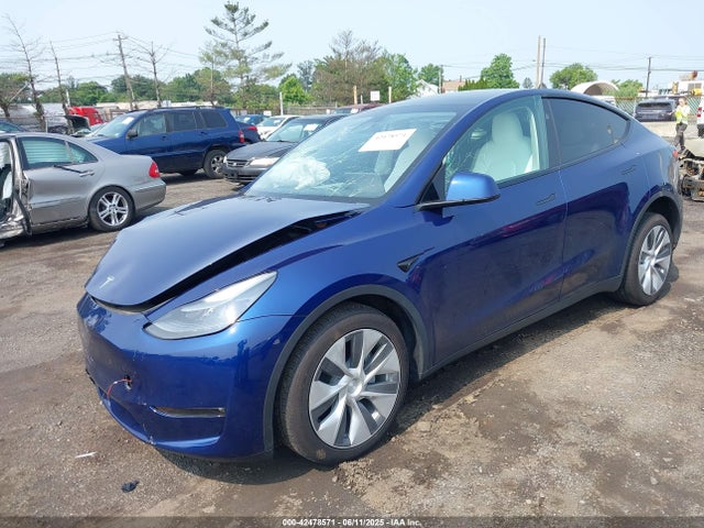 2023 TESLA MODEL Y 7SAYGDEE0PF798850 Photo 1