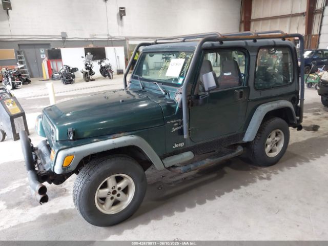 2000 JEEP WRANGLER 1J4FA49S5YP725979 Photo 1