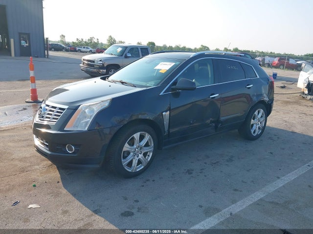 2014 CADILLAC SRX 3GYFNFE35ES663320 Photo 1