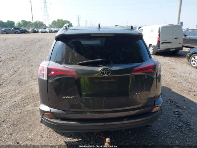 JTMZFREVXJJ162065 Toyota RAV4 LE