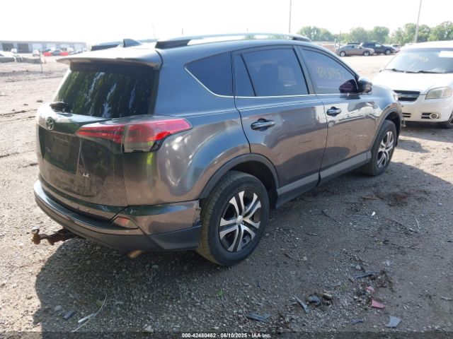 JTMZFREVXJJ162065 Toyota RAV4 LE