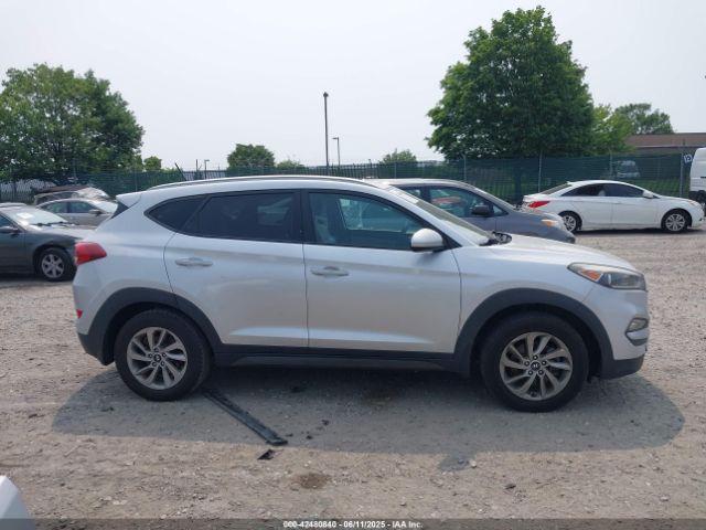KM8J3CA40GU074189 Hyundai TUCSON SE